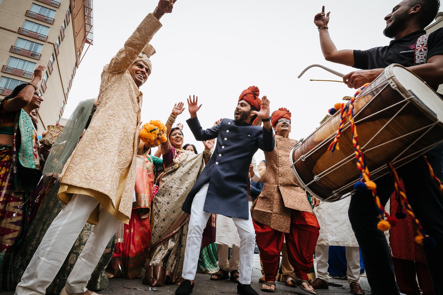 The drummer and family including the groom Brazos Hall Austin South Hindu asian wedding ceremony