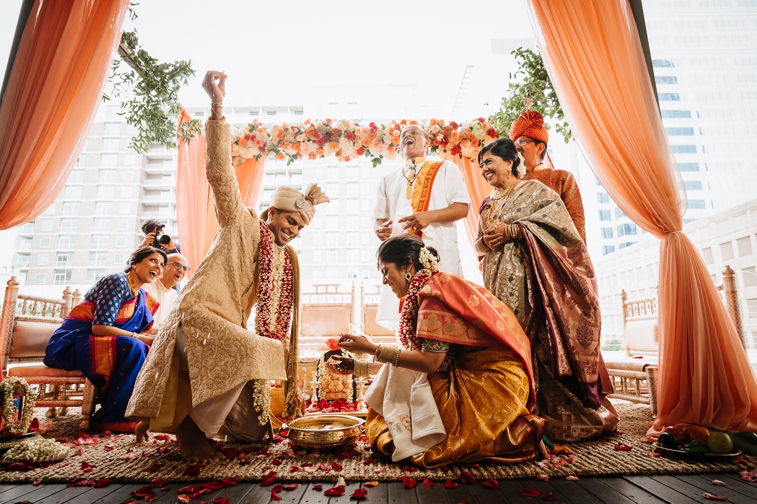 During a south asian wedding ceremony play a game find the ring at Brazos Hall in Austin Texas