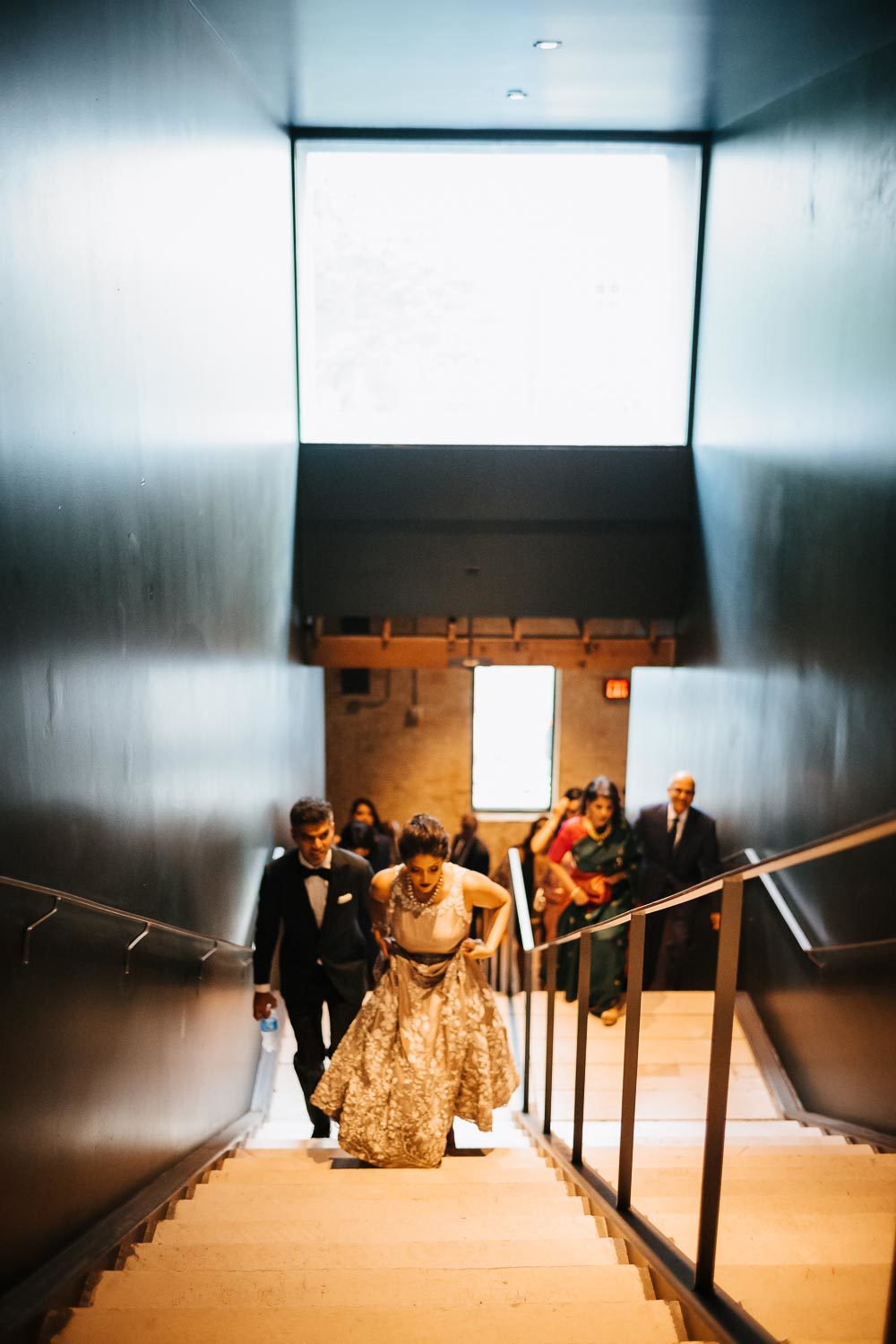 For the evening reception couple arrive at Brazos Hall Austin