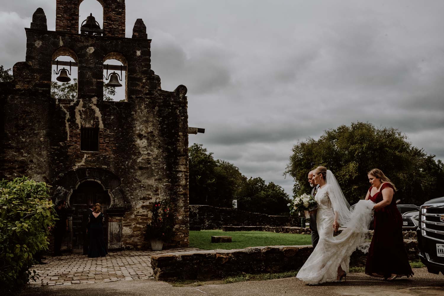 Bride-arrives-at-Mission-Espada-on-her-wedding-day---San-Antonio-Texas-wedding-photographer-Philip-Thomas