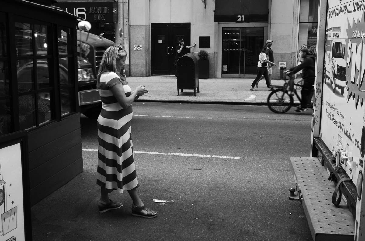 A lady in a striped dress Street photography in New York by Philip Thomas L1000277