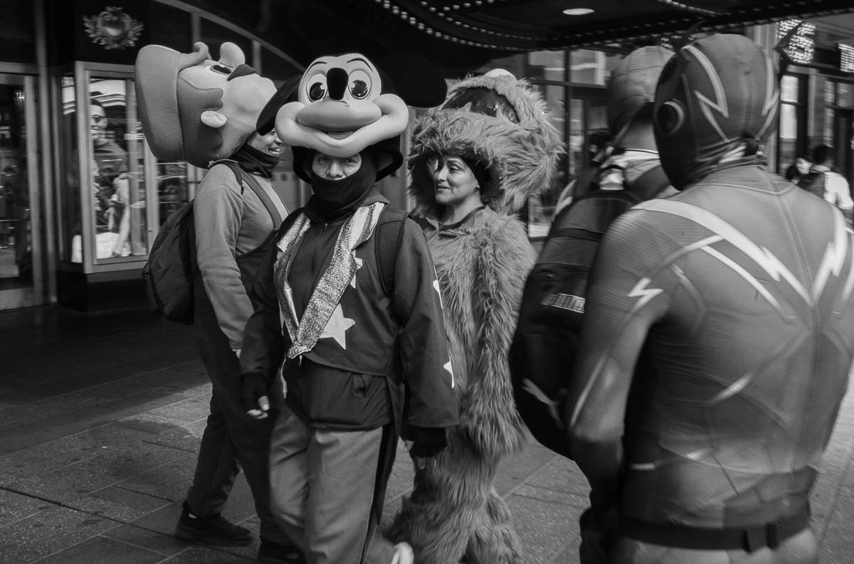 Character actors on a break in Times Square , NYC L1000294