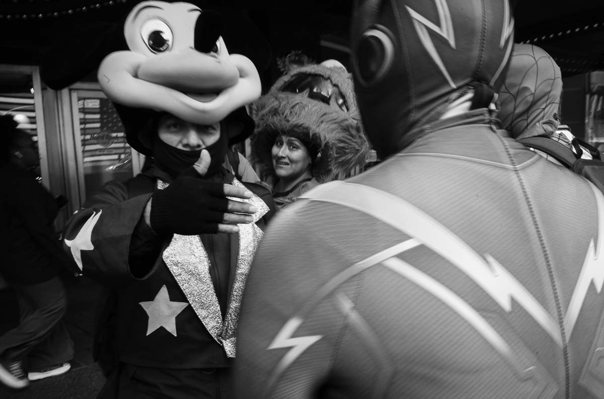 Character actors on a break in Times Square , NYC -L1000296