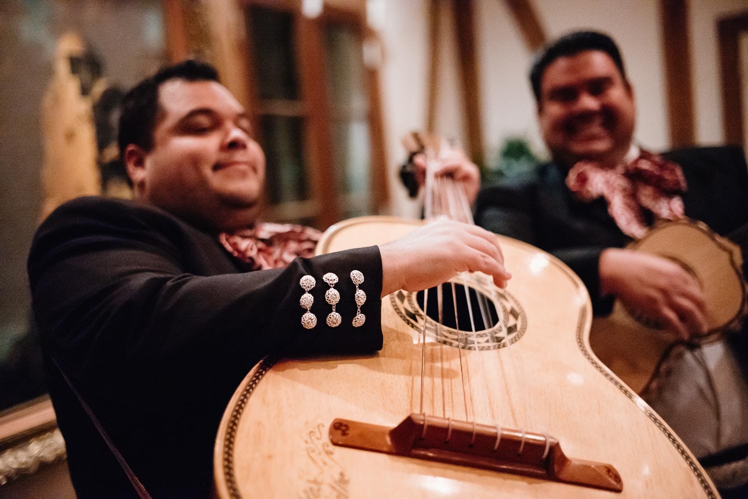 Mariachis play music at Club Giraud