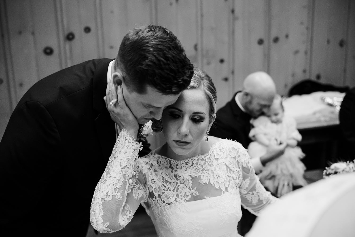 A moment between groom and bride preceremony inside the Witte Museum brides room