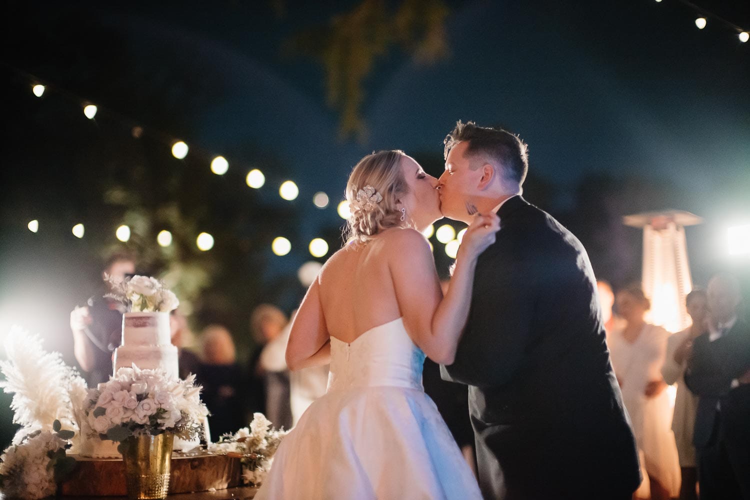 After cutting the cake Kelsey and Dan kiss