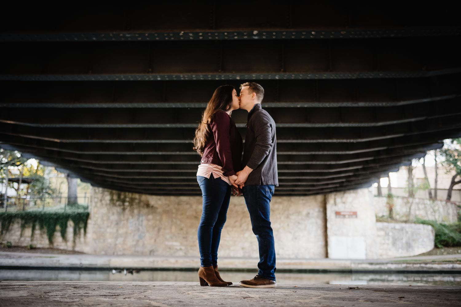 Engagement session under bridge along the San Antonio river in King William District