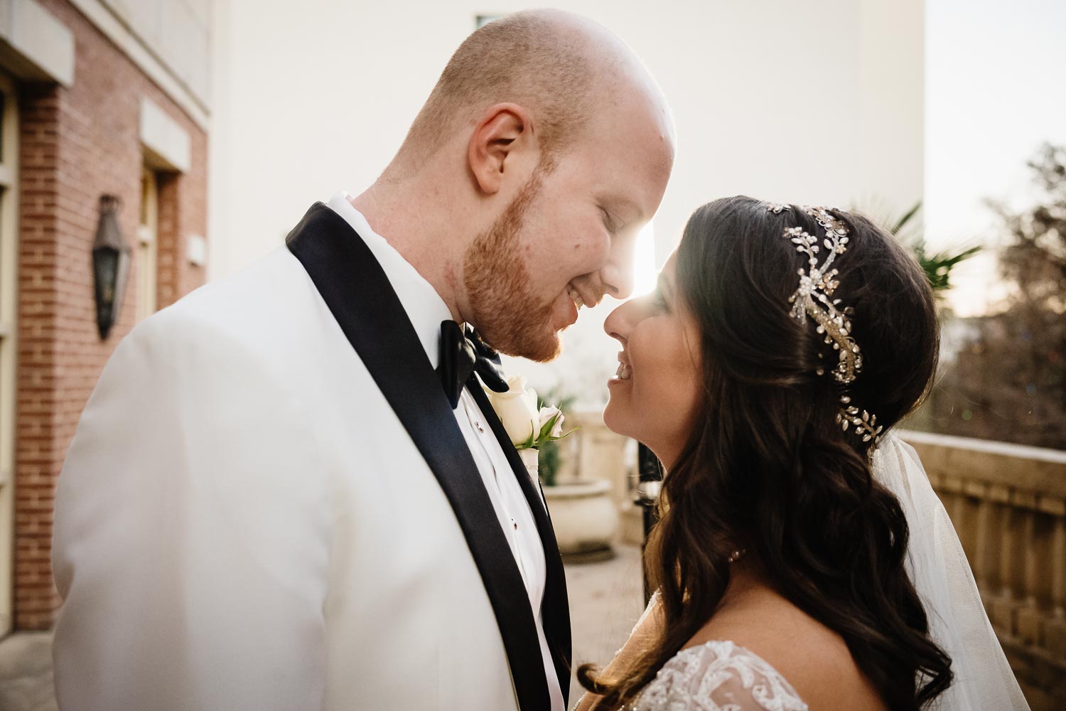 Couple Debra and Ryan on hotel balcony at Westin Riverwalk Hotel Jewish Wedding Ceremony Reception San Antonio Texas-Philip Thomas Photography