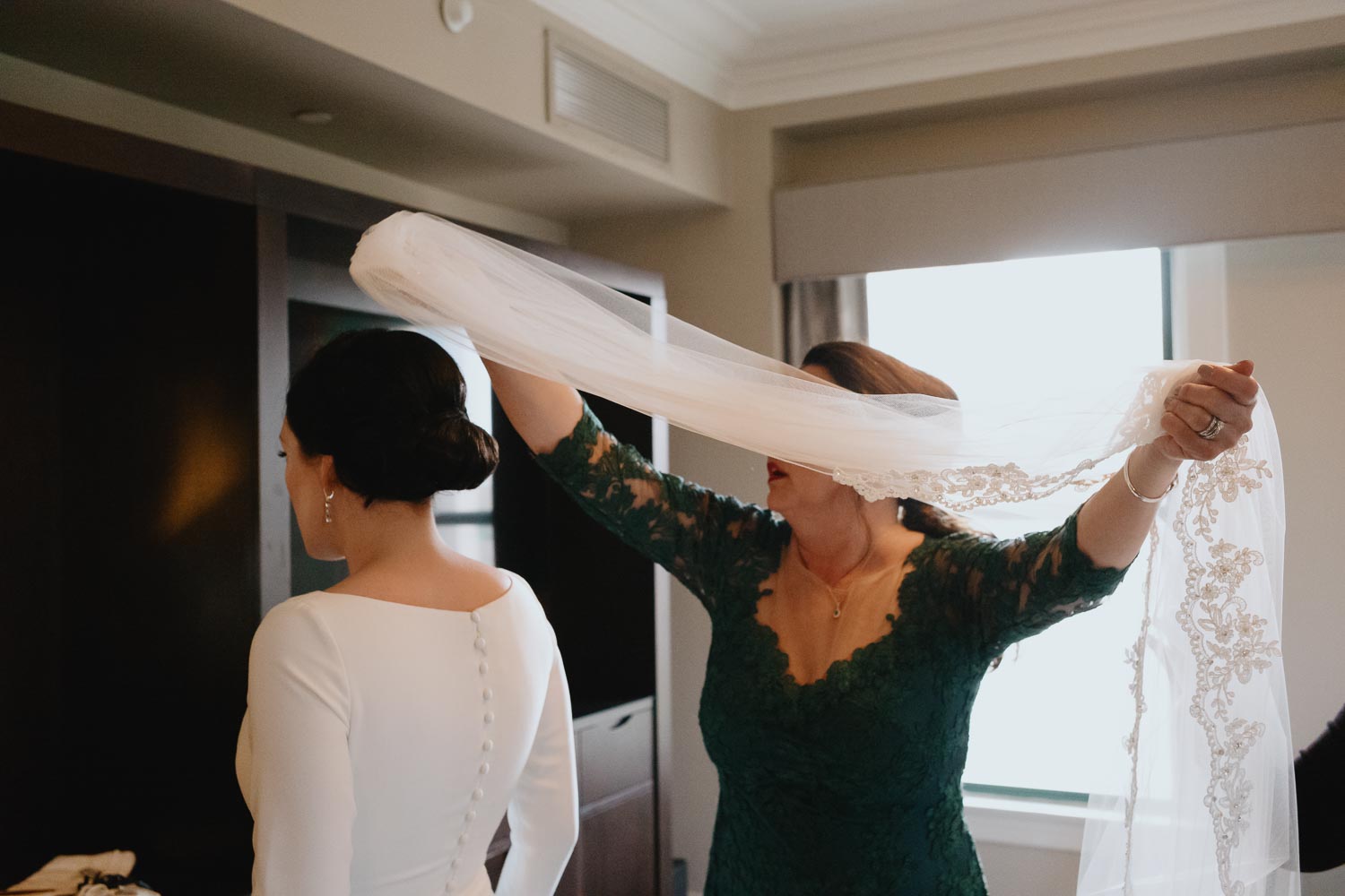 St Anthony Hotel Wedding getting ready winter wedding-Leica photographer-Philip Thomas Photography