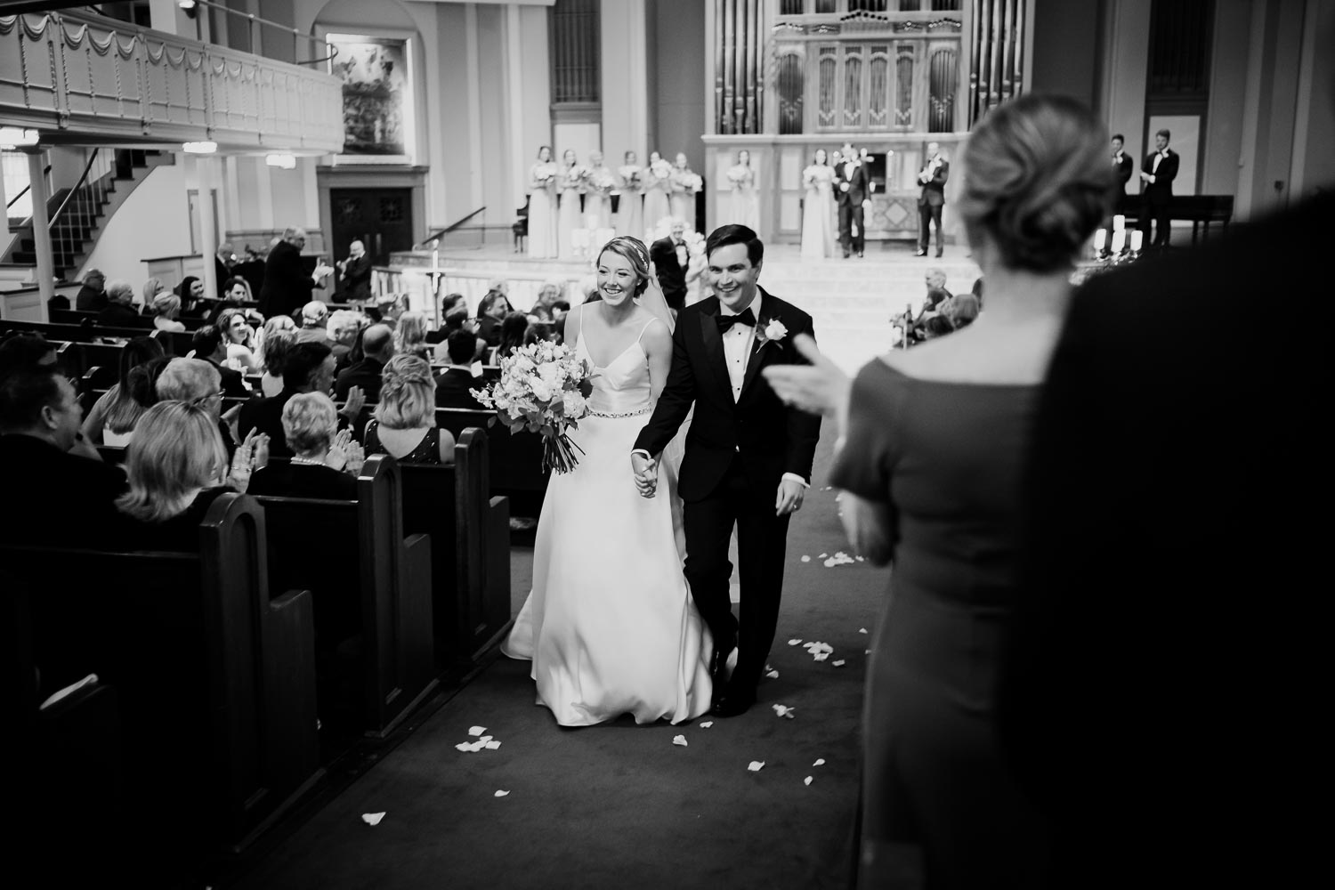 A newly married couple, Alison and Connor ride on a wave of bliss at Travis Park Church, San Antonio, Texas - Leica M10 + 35 Summilux f2 1/60