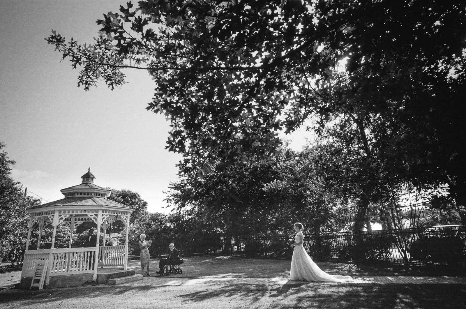The bride walks down to the gazebo during the COVID-19 pandemic at Wedding at the The Grande Ballroom in New Braunfels Texas