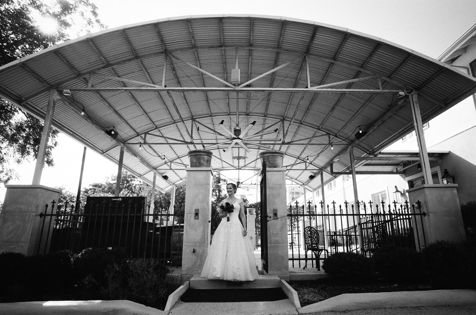 Wedding at the The Grande Ballroom in New Braunfels Texas shows a bride waiitng for the ceremony to begin