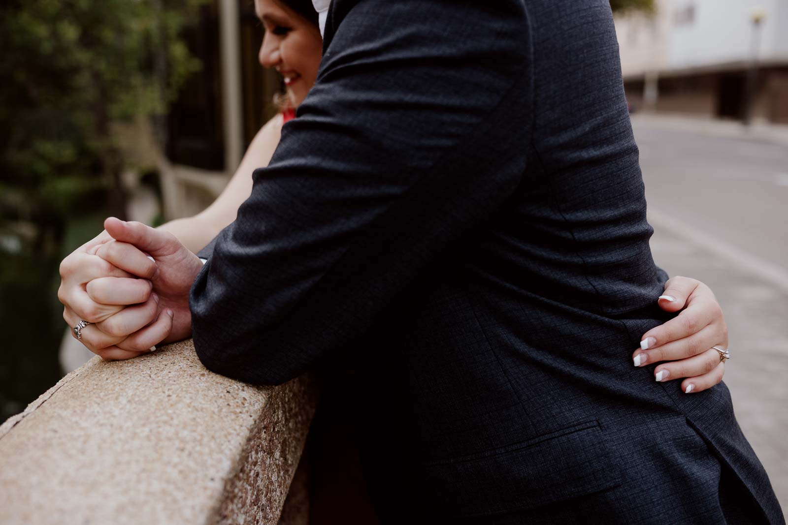 Close up of love engagement shoot wrapped around waists Leica Wedding Photographer-- 1San Antonio engagement shoot downtown - Philip Thomas