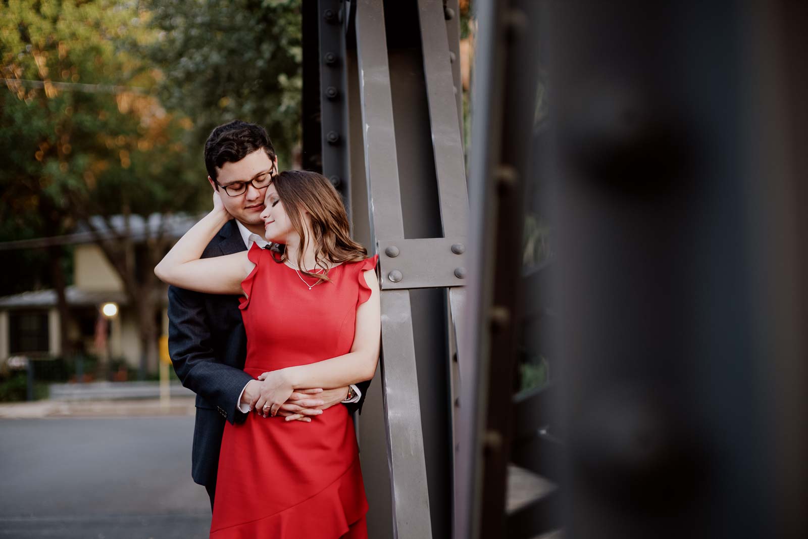 Engaged couple pose during sunset on Arsenal Bridge Leica Wedding Photographer-- 1San Antonio engagement shoot downtown - Philip Thomas