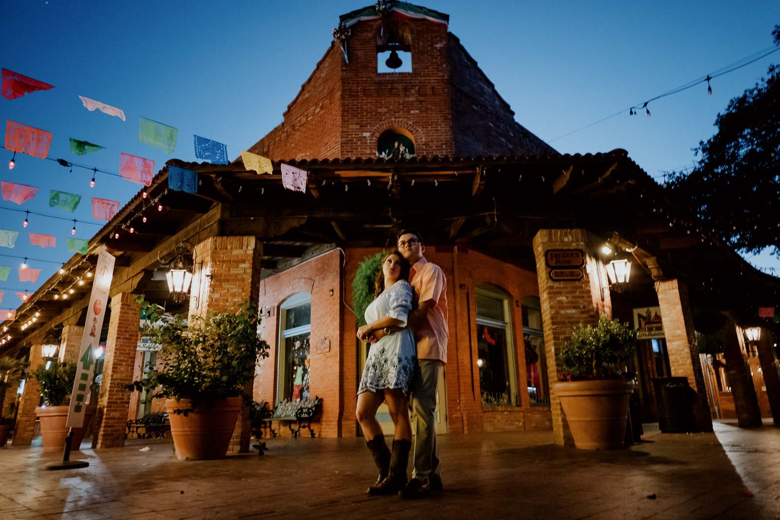 A couple at the Historic Market Square and King William downtown engagement shoot in San Antonio Texas