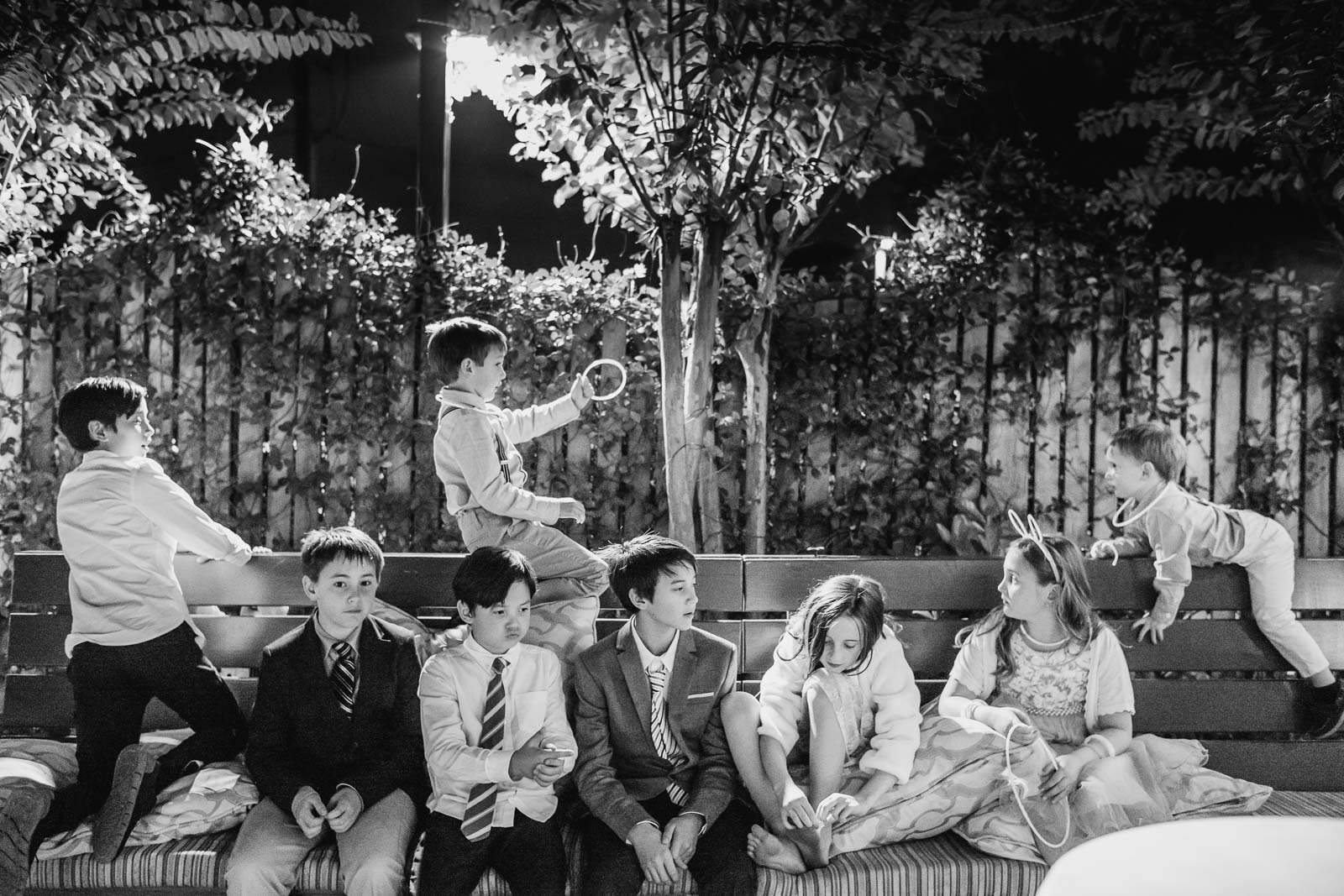 Children of families at Martin and Katie tied the knot at the Cathedral of Our Lady of Walsingham, and their reception was at Ouisie's Table in Houston. have a fun moment. Inspired by Henri Cartier-Bresson.