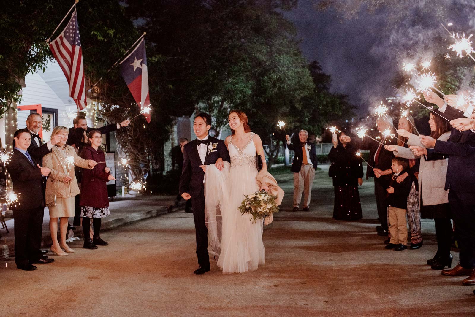 Wedded Couple depart Ouisie's Table in Houston Texas in a late fall wedding