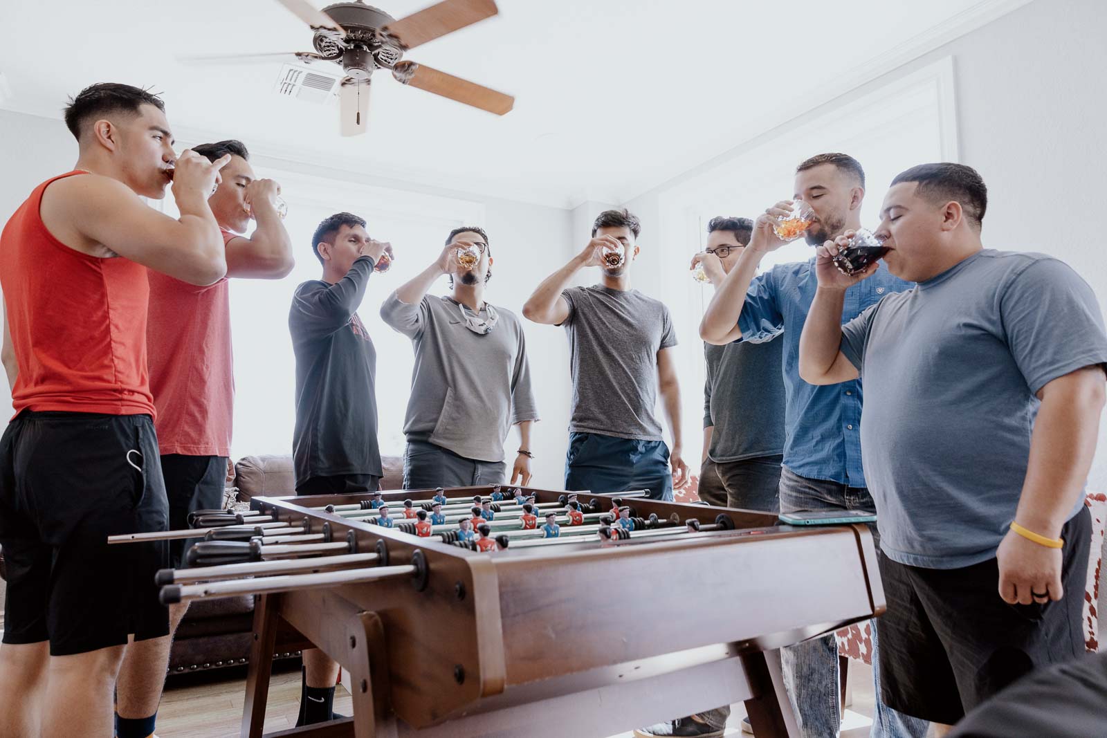 The groomsmen at Kendall point in Texas toast And raise our glasses
