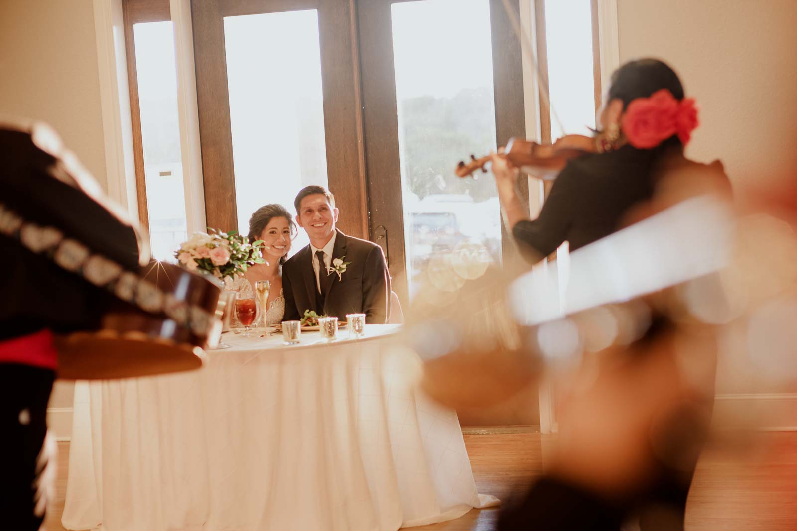 The Marriott she’s play as the bride and groom get nice and close at the head table