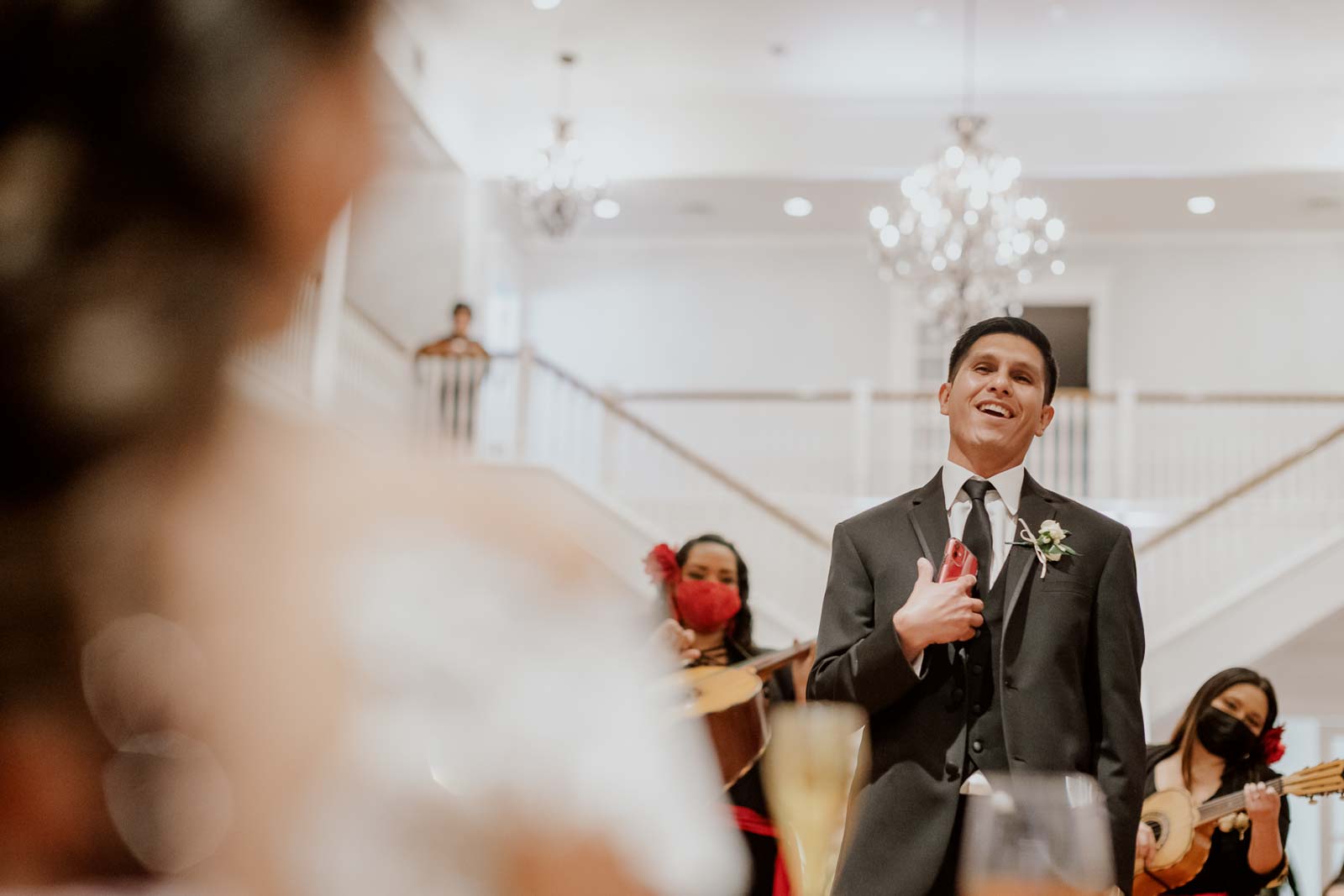 The room serenades the bride as Marie and she’s play in a very romantic moment at Kendall point reception