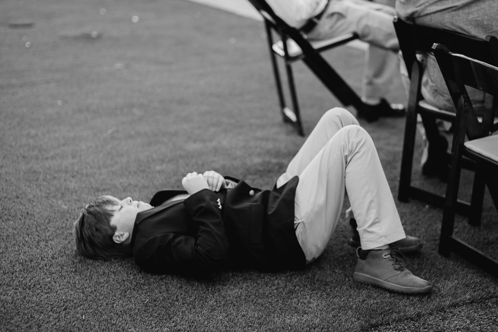 A boy lives on the ground during the rehearsal of the ceremony at The Argyle