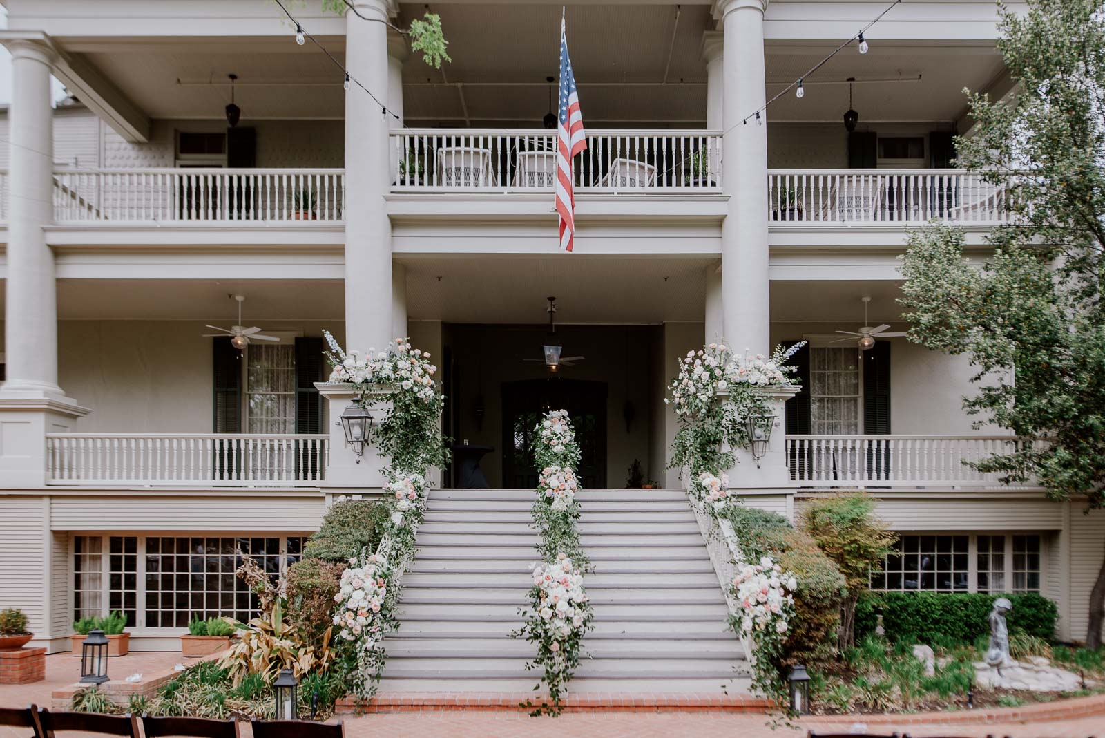 morning photograph taken of The Argyle with the wedding flowers decorating the stairs outside