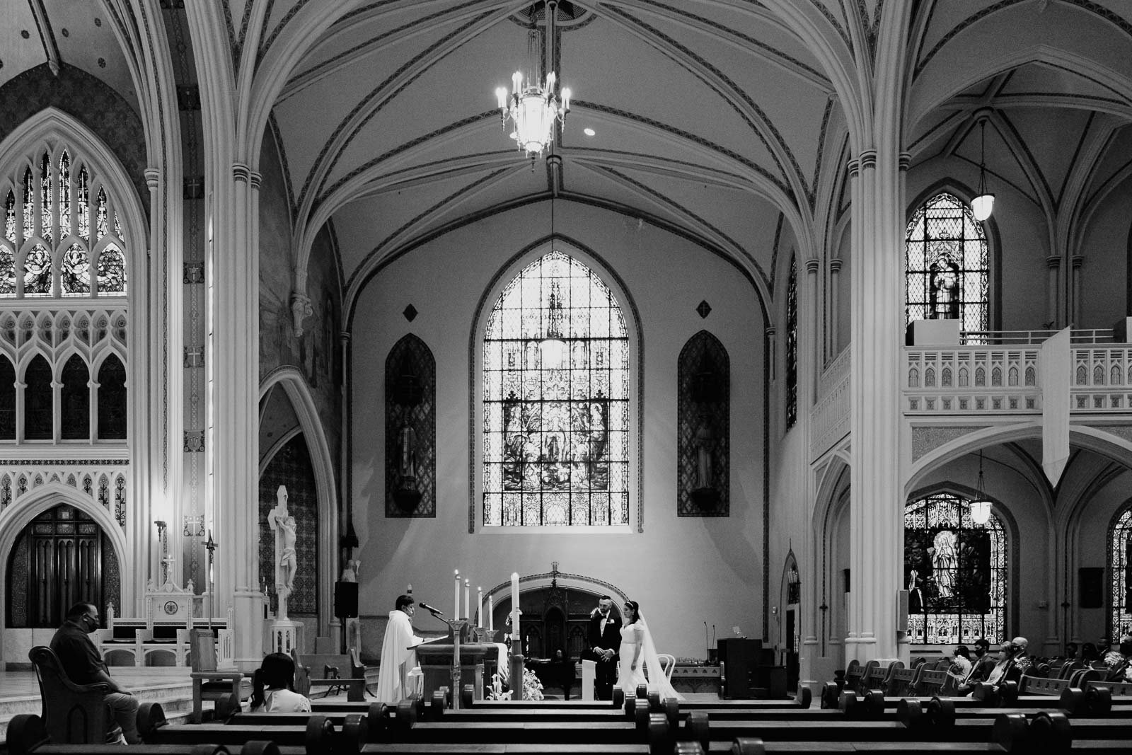 A monochrome shot captured with a Leica M during a wedding ceremony at Sacred Heart Chapel-Leica photographer-Philip Thomas Photography