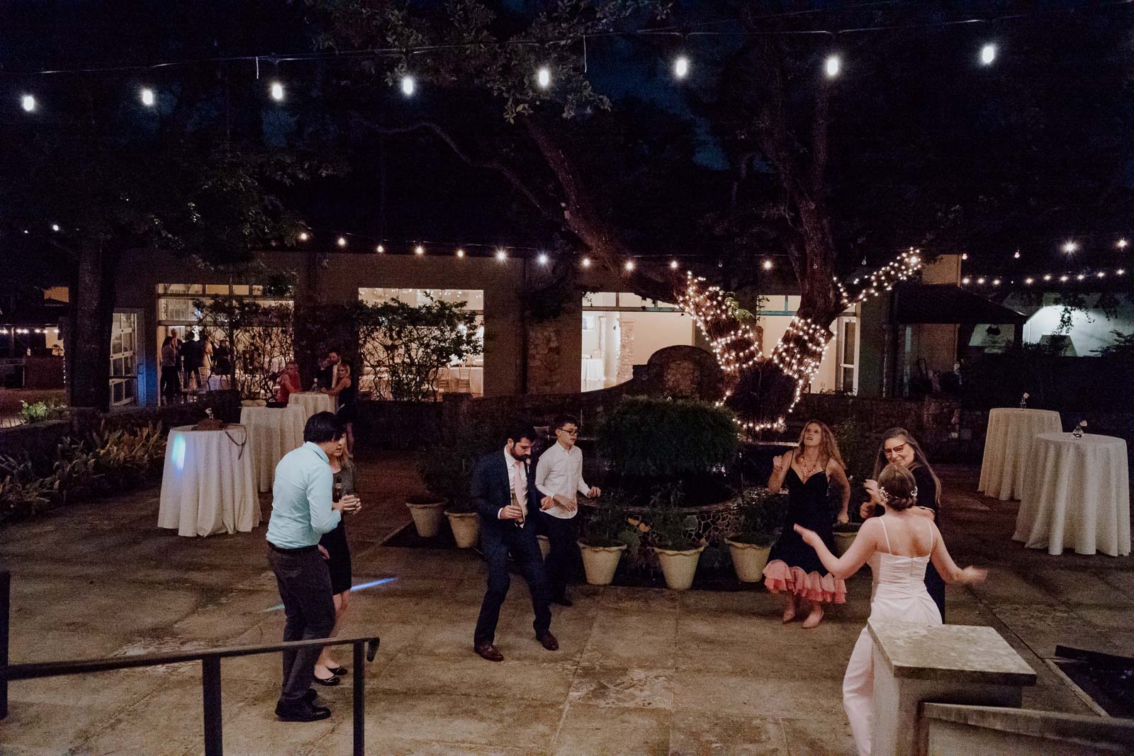 More photos of the reception with other guests dancing captured from the main building looking out towards the reception building