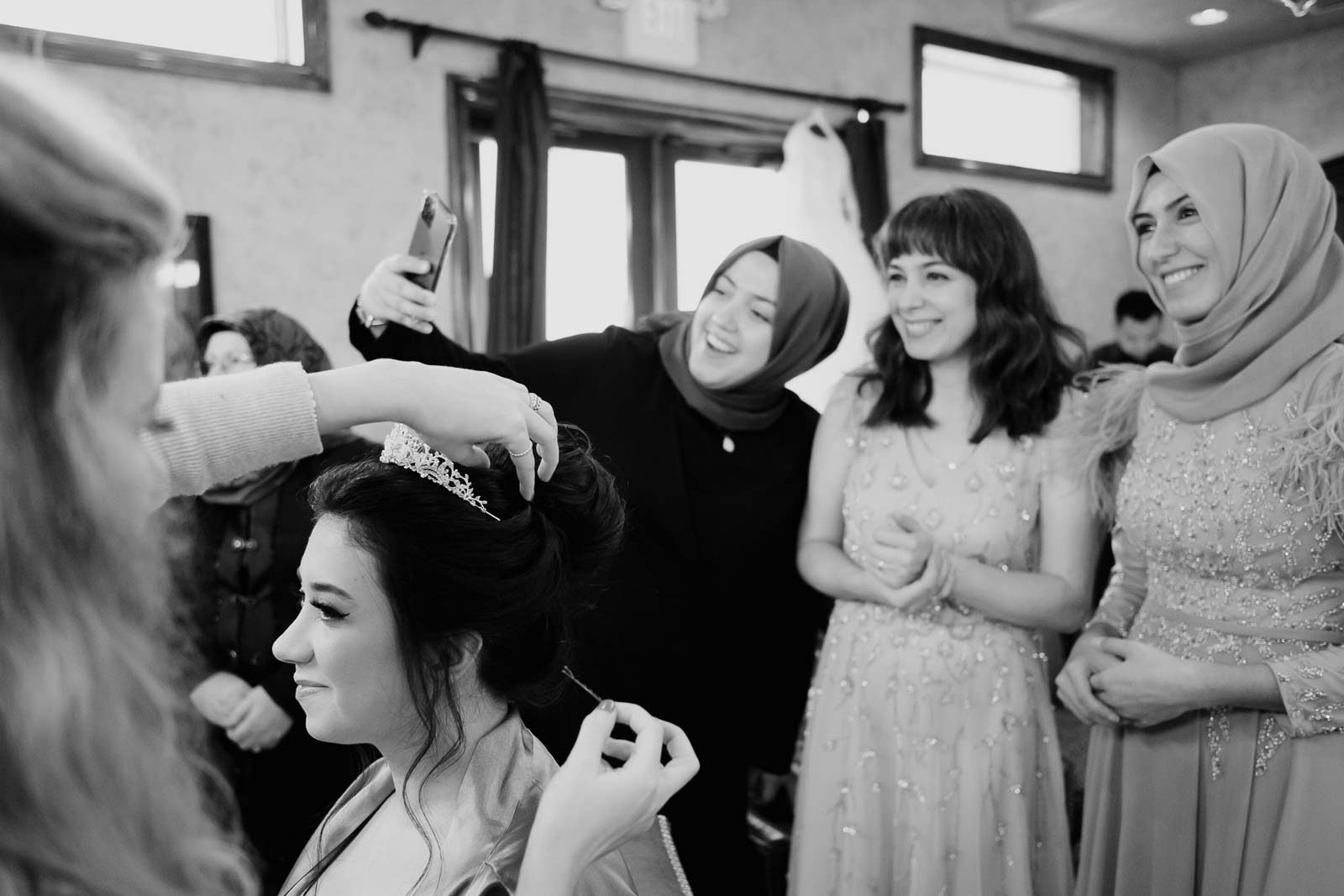 Bride and her family and friends take a selfie