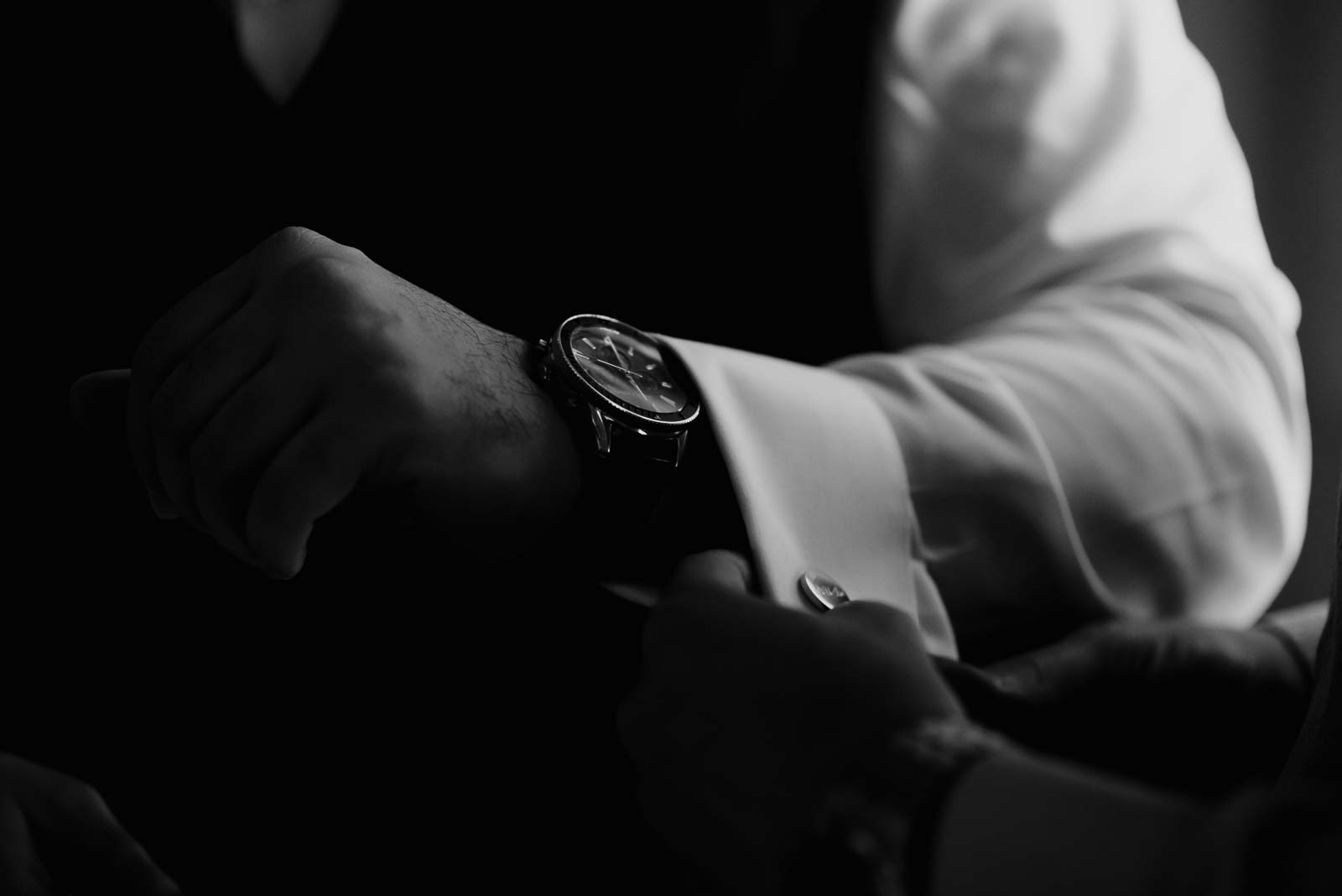 The groom checks his watch and Catholics replied in the photo at Briscoe manner