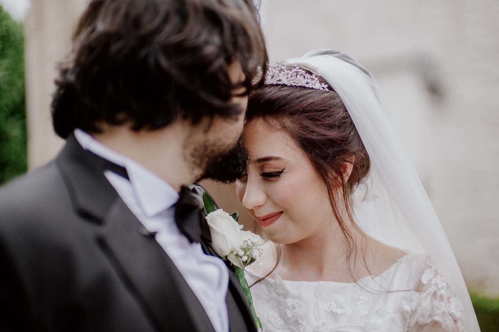 The groom kiss full head of the bride her information for traits