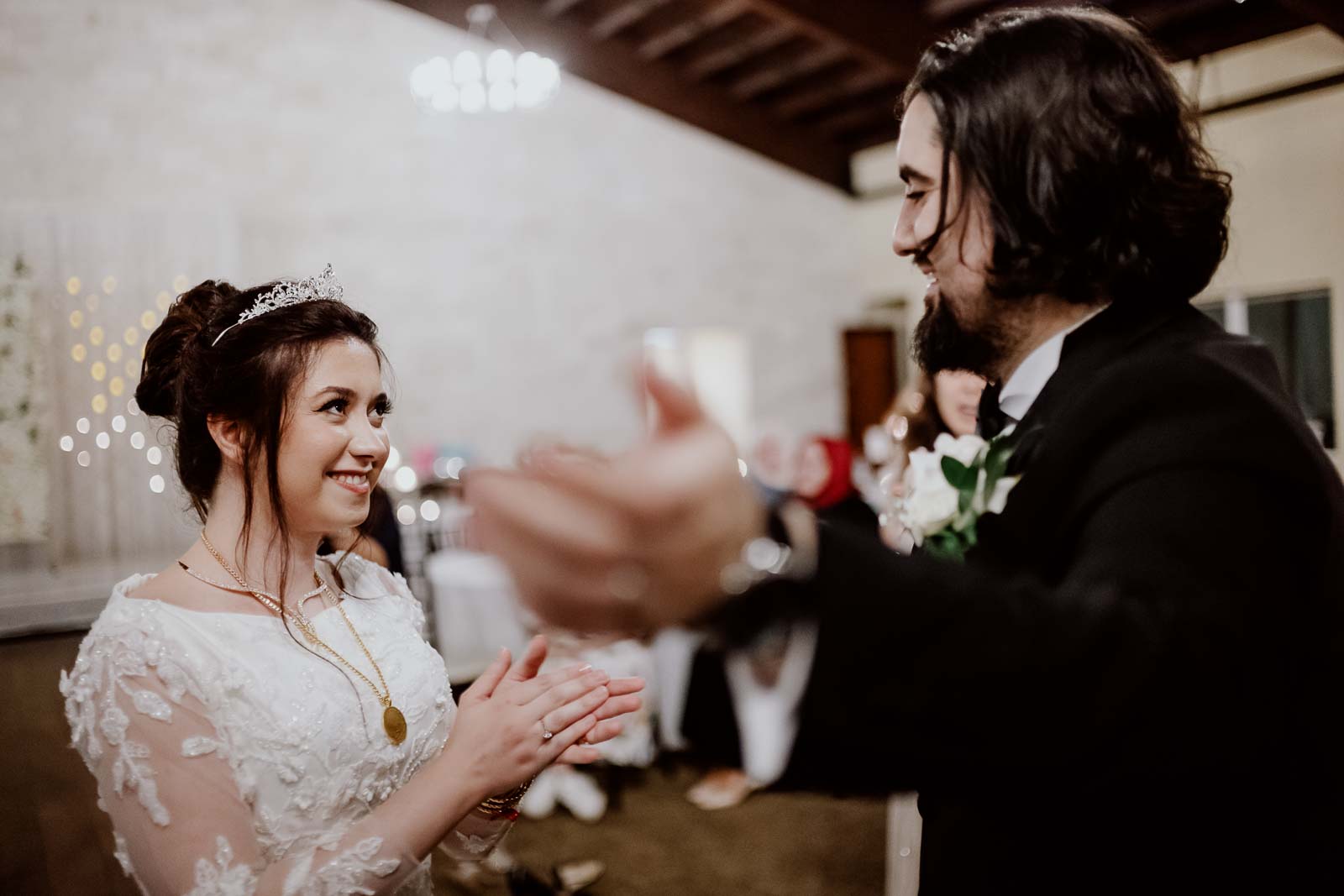 The bride and groom greet each other 