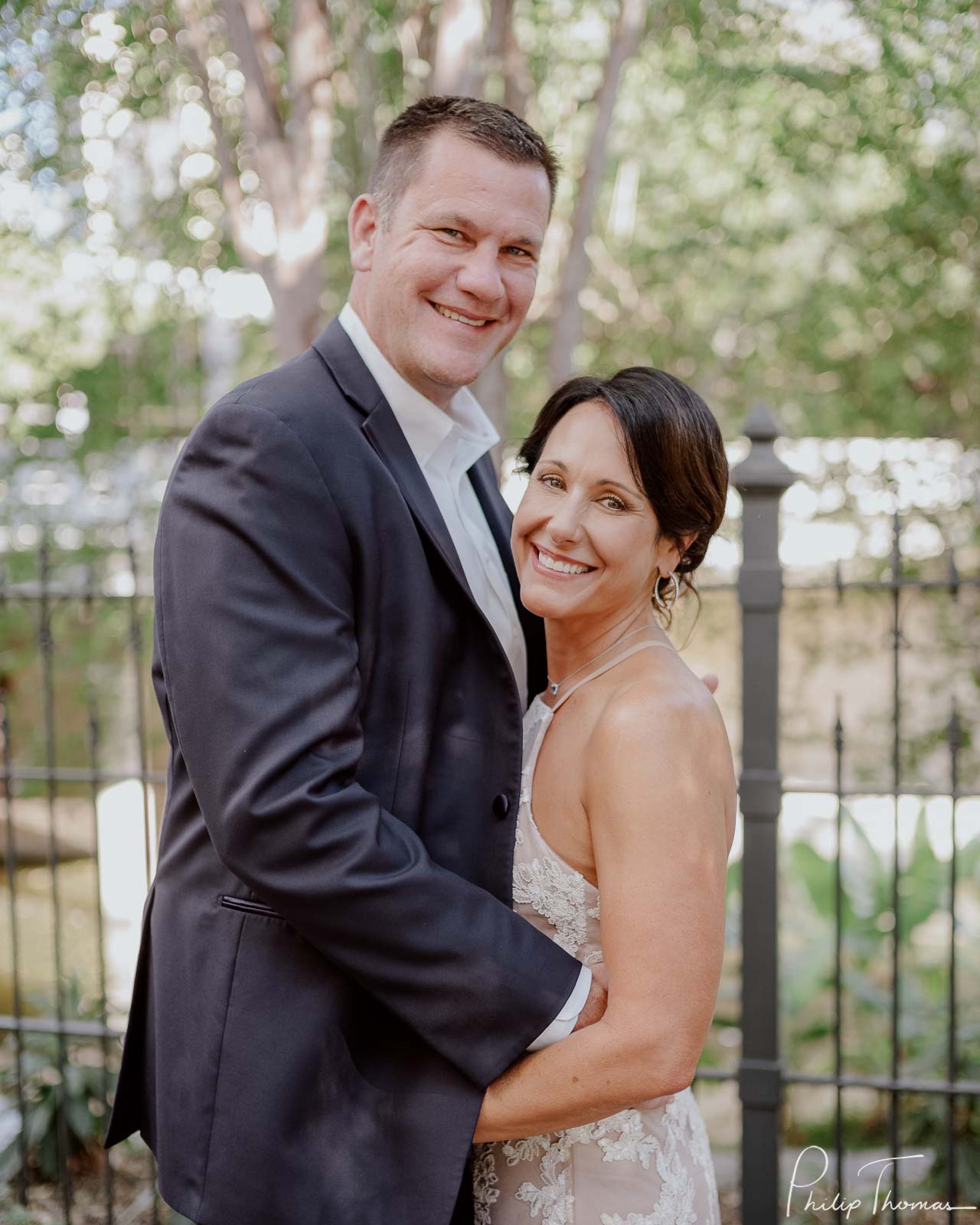 The happy couple pose for a picture atClub Giraud Wedding Reception San Antonio weddings Philip Thomas Photography