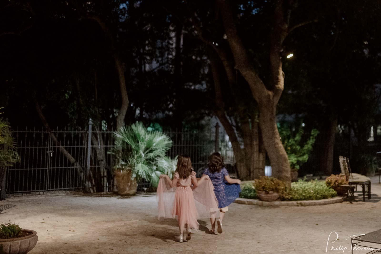 Flower girls playing make believe princesses at Club Giraud Wedding Reception San Antonio weddings Philip Thomas Photography