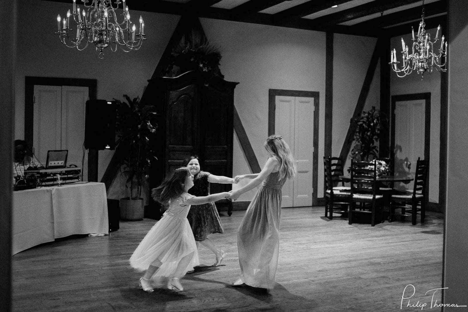 Kids being kids on dance floor at Club Giraud Wedding Reception San Antonio weddings Philip Thomas Photography