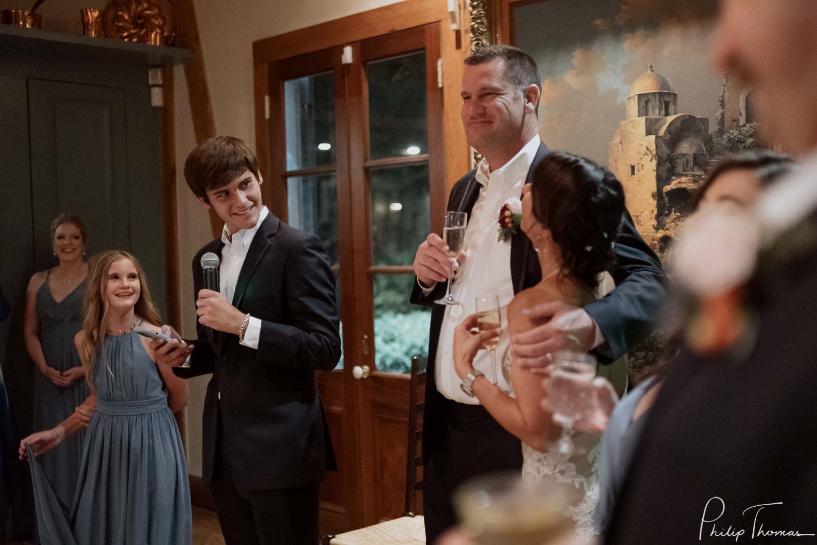 Grooms son expression during speech and toast Club Giraud Wedding Reception San Antonio weddings Philip Thomas Photography