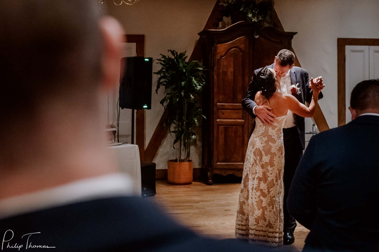 Couple in ,ovely light during first dance Club Giraud Wedding Reception San Antonio weddings Philip Thomas Photography