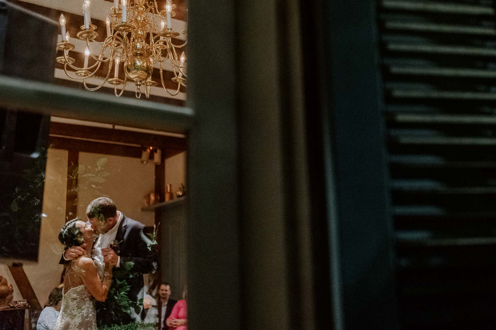 Couple kiss at Club Giraud Wedding Reception San Antonio weddings Philip Thomas Photography