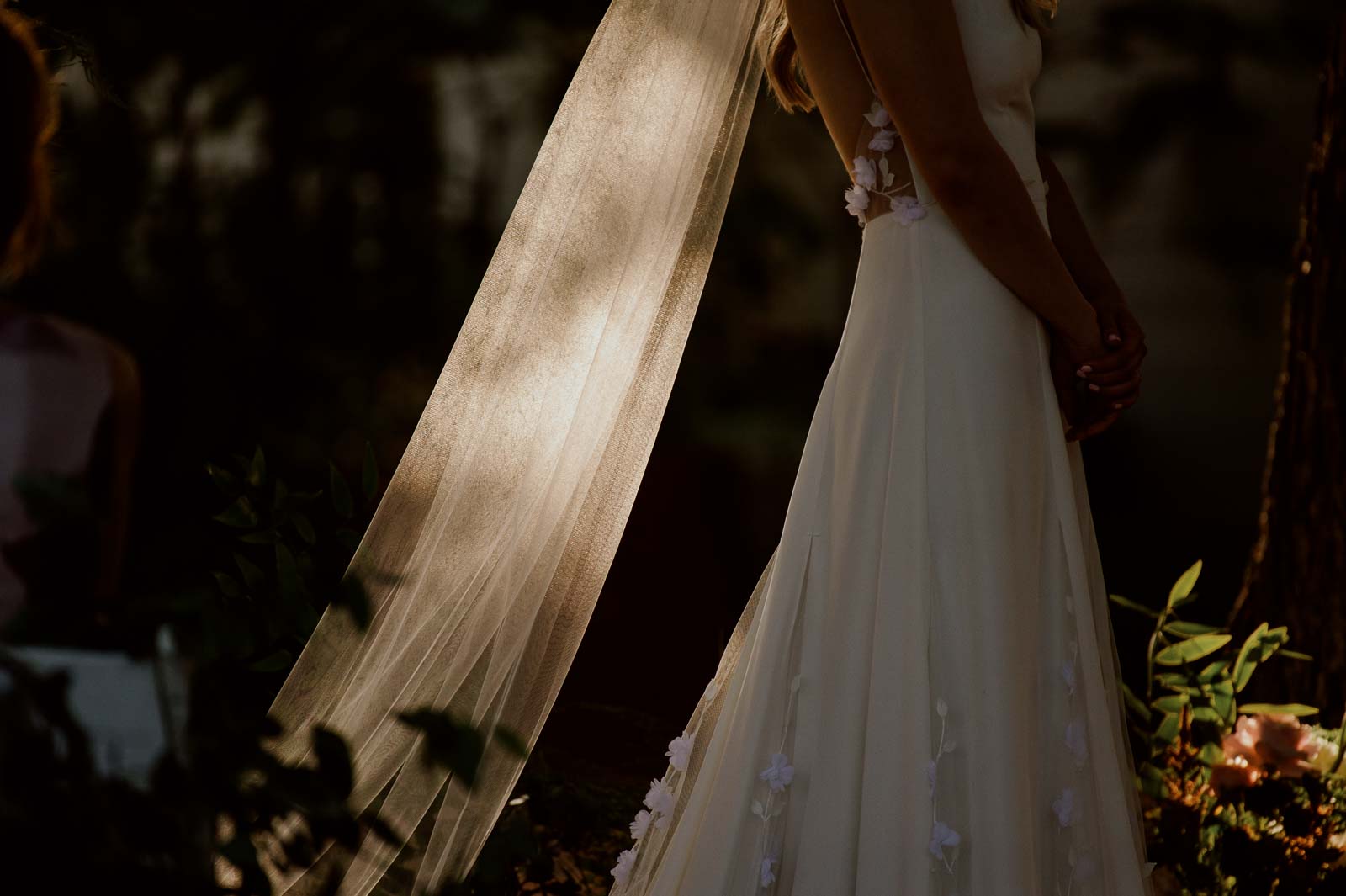 An extreme closeup of the bride's veil blowing in the wind at Barr Mansion in Austin, Texas, USA. Photographed by Philip Thomas