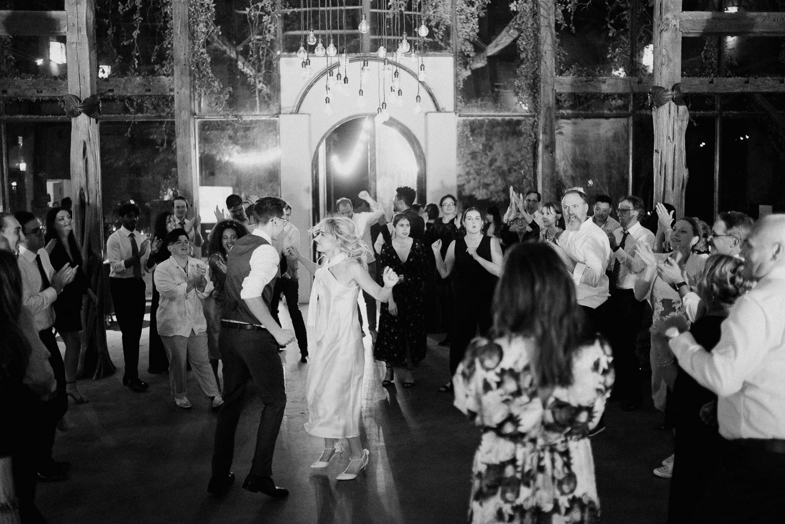 The couple dance the night away at Barr Mansion ballroom surrounded by friends and family