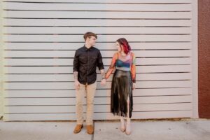 Engagement session of couple o Westheimer behind Pavement store