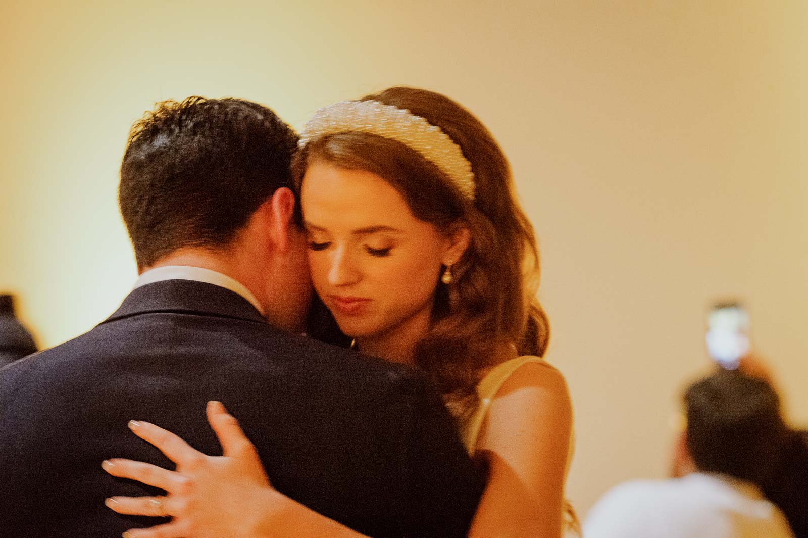 First dance shows bride eyes closed at the McNay 