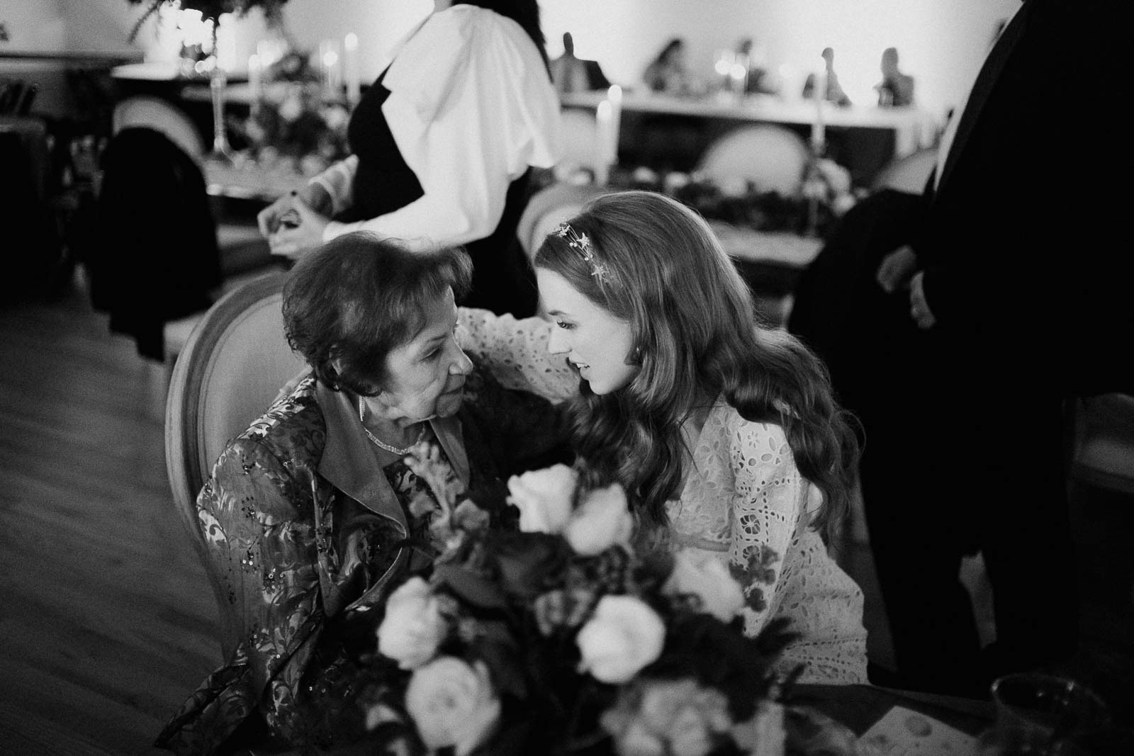 A sweet moment between the bride and a wedding guest at the McNay