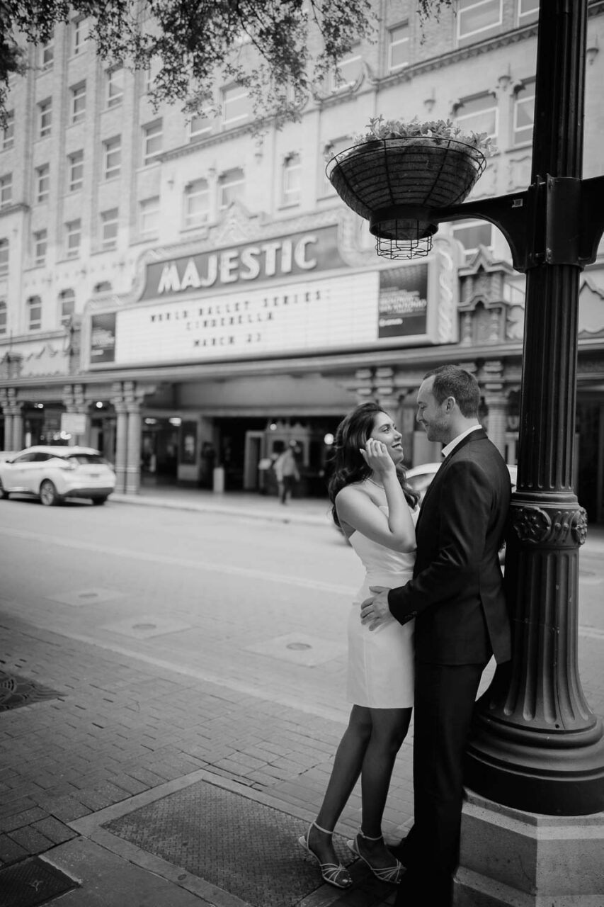 A downtown engagement session on Houston Street across the road from the Majestic Theater in San Antonio, Texas