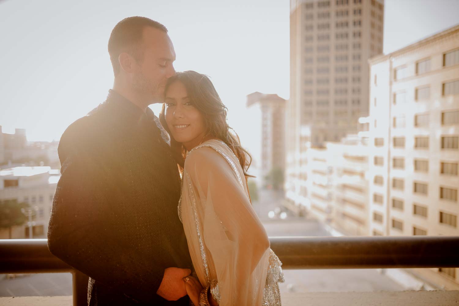A sunset engagement session in downtown parking lot in San Antonio, Texas
