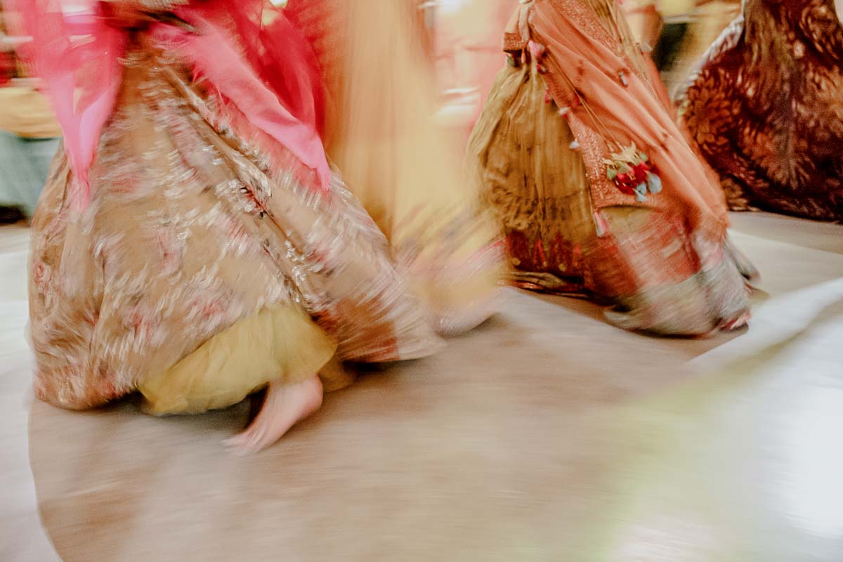 A sangeet celebration is a traditional pre-wedding event in Indian culture that involves music, dance, and food. It's a time for family and friends to come together and celebrate the upcoming wedding festively and joyously.