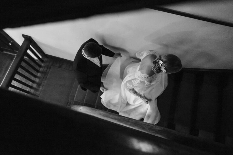 San Antonio wedding photographers Philip Thomas captures wedded couple ascending staircase at Hotel Havana - LM102788 2