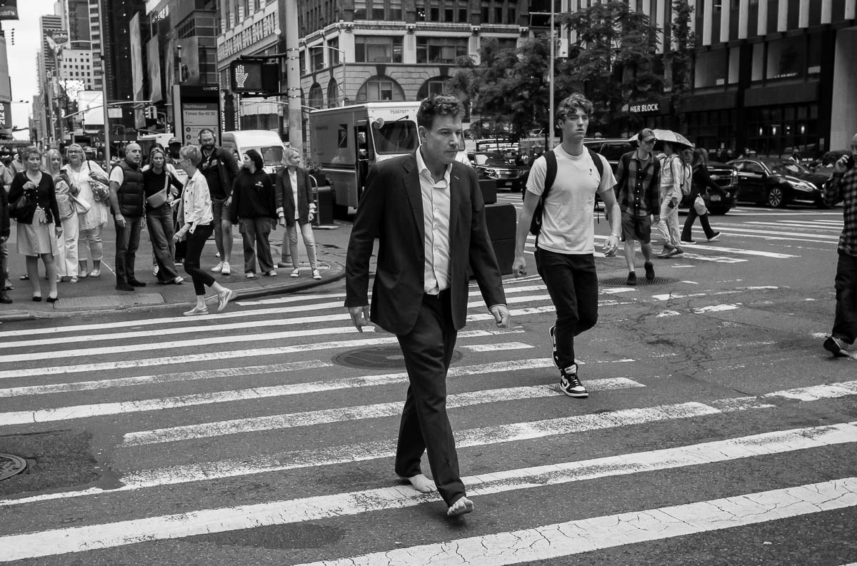 June 23 New York City. Man with no shoes in nice suit 7th ave W 40th st L1000715