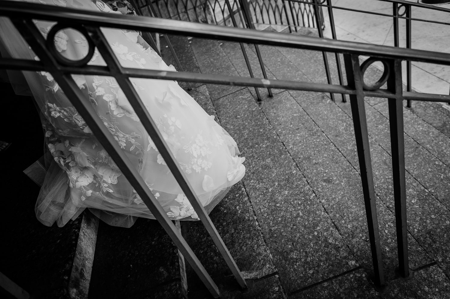 Wedding Ceremony St. Joseph's + The Westin Riverwalk, San Antonio 15 a bride's dress on a staircase