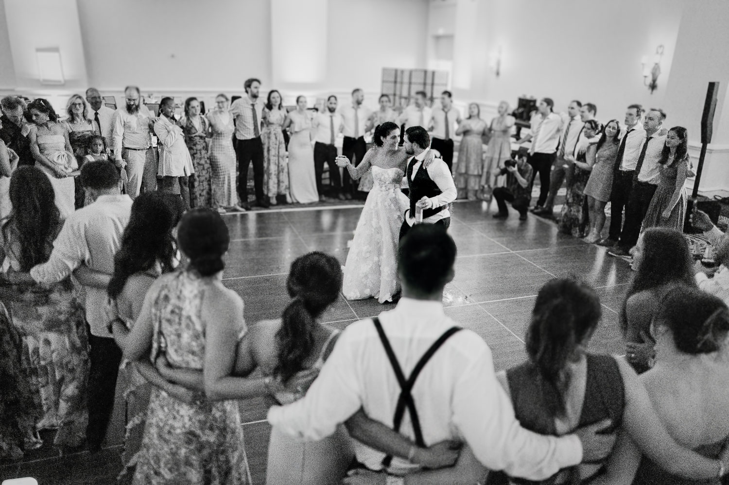 Wedding Ceremony St. Joseph's + The Westin Riverwalk, San Antonio 69 a man and woman dancing in a room with people around them